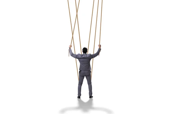 Zakenman marionet wordt gemanipuleerd door touwen — Stockfoto