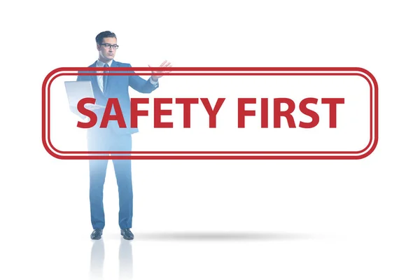 Safety first concept with businessman — Stock Photo, Image