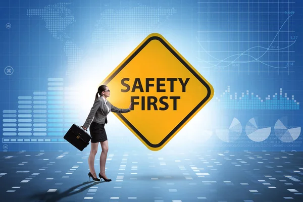 Safety first badge with business people — Stock Photo, Image