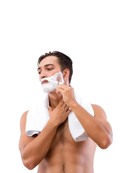 Yakışıklı adam, beyazın üzerinde tek başına tıraş oluyor. — Stok fotoğraf
