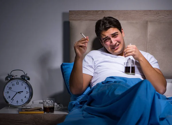 Desperate man divorced in bed — Stock Photo, Image