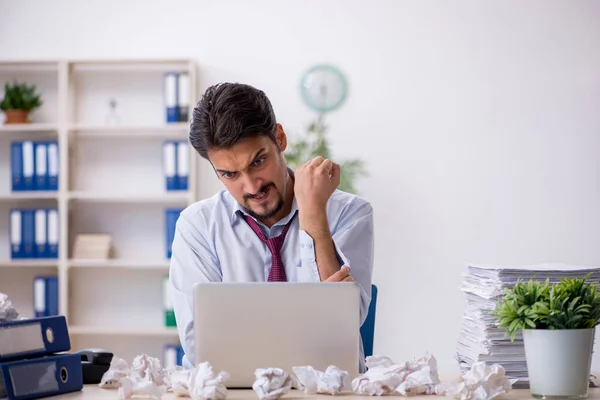 Young male employee in rejected ideas concept — Stock Photo, Image