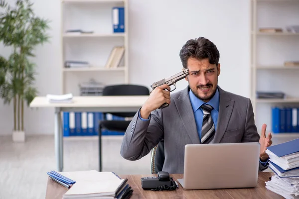 Young male employee committing suicide in the office — Stock Photo, Image