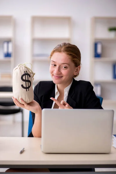 Young female employee in remuneration concept — Stock Photo, Image