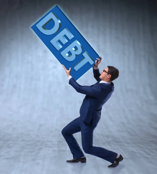 Hombre luchando con alta deuda — Foto de Stock