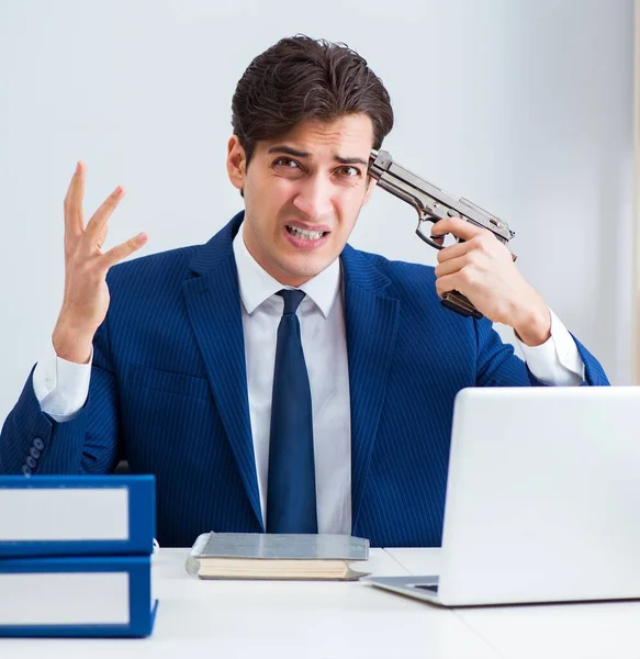 Young handsome businessman committing suicide in the office — Stock Photo, Image