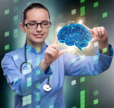 Tıbbi konseptte beyni olan kadın doktor.