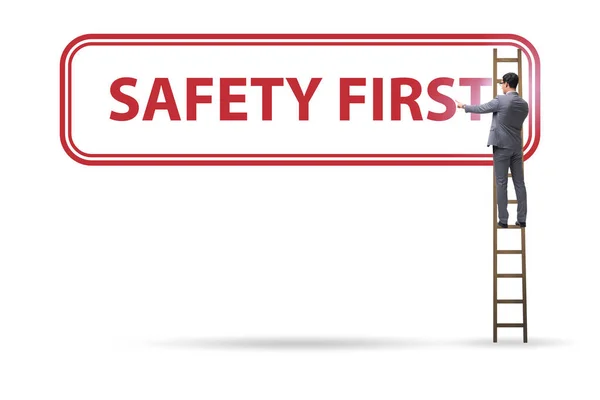 Safety first concept with businessman — Stock Photo, Image