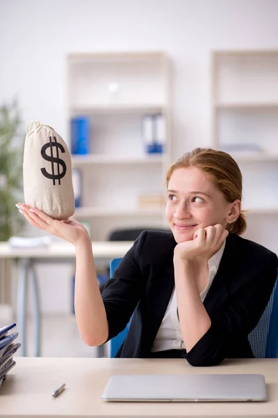 Young female employee in remuneration concept — Stock Photo, Image