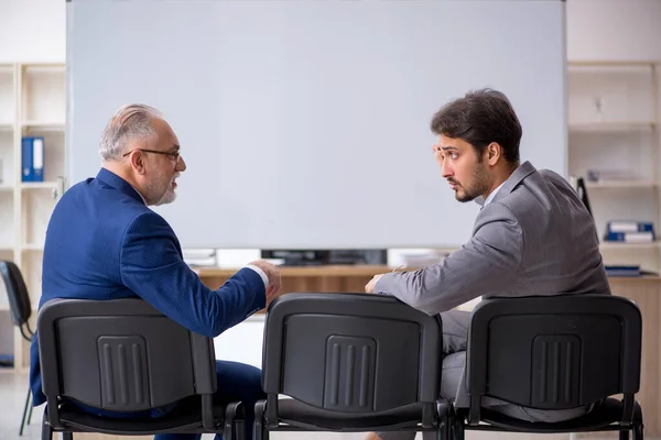 Two male colleagues in business presentation concept — Stock Photo, Image