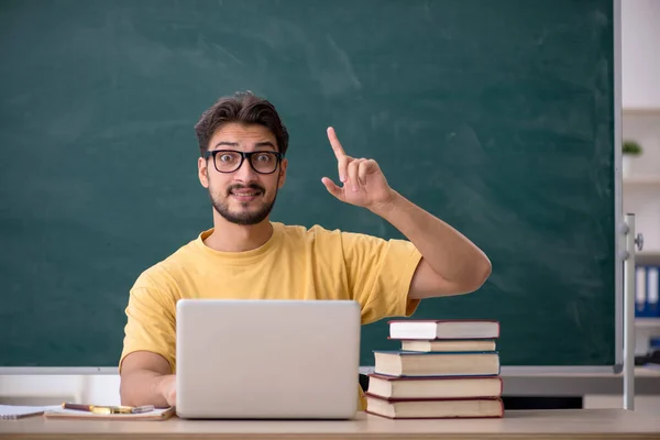 Young male student in telestudying concept — Stock Photo, Image