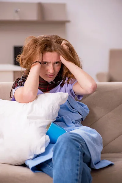 Young woman suffering at home — Stock Photo, Image
