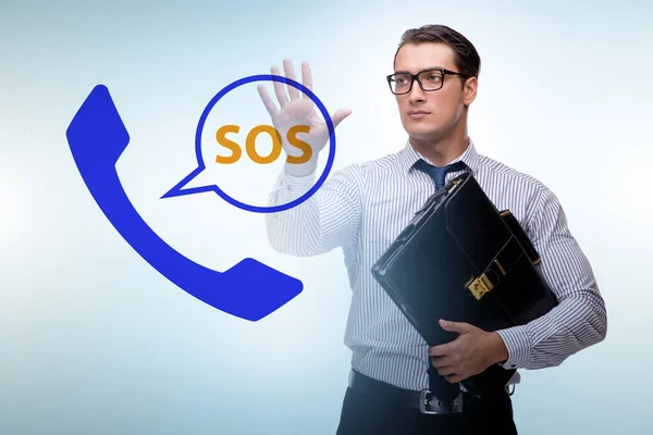 Zakenman drukt op de SOS-knop in geval van gevaar — Stockfoto