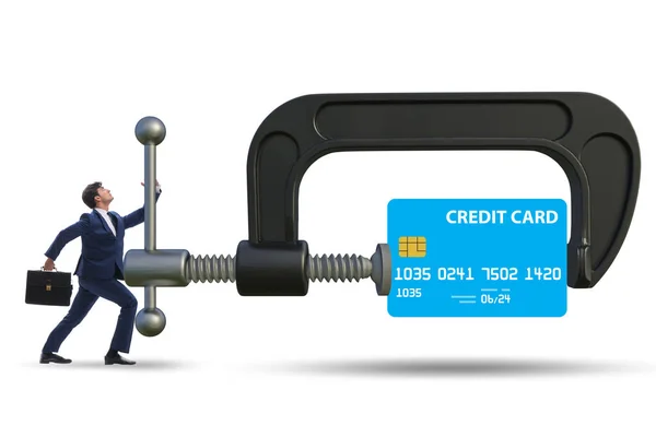 Concept of credit card debt with clamp and businessman — Photo