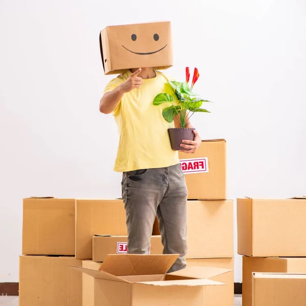 The happy man with box instead of his head