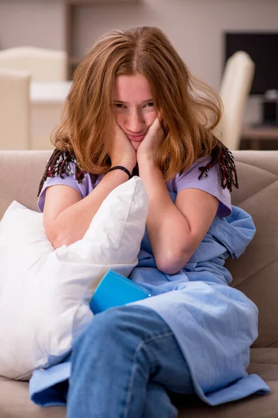 Young woman suffering at home — Stock Photo, Image