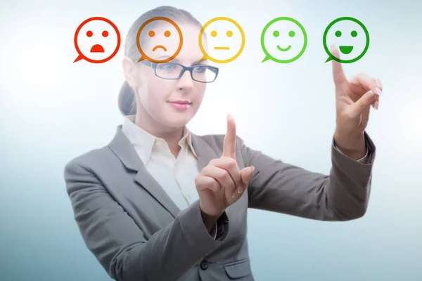 Businesswoman in customer feedback concept — 图库照片