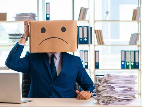 The unhappy man with box instead of his head — Stock Photo, Image