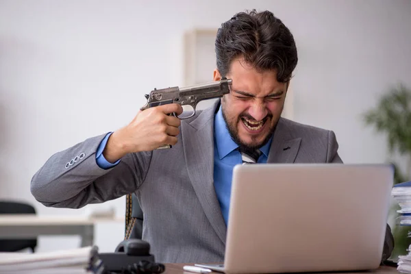 Young male employee committing suicide in the office — Stock Photo, Image