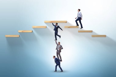 İş adamlarının birbirine yardım ettiği takım çalışması konsepti