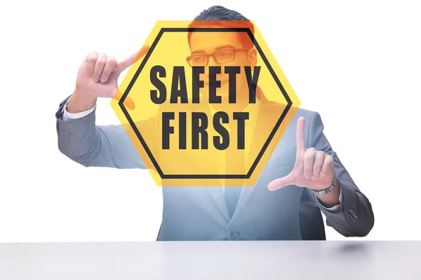 Safety first concept with businessman — Stock Photo, Image