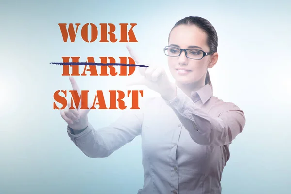 Businesswoman in working smart not hard concept — Stock Photo, Image