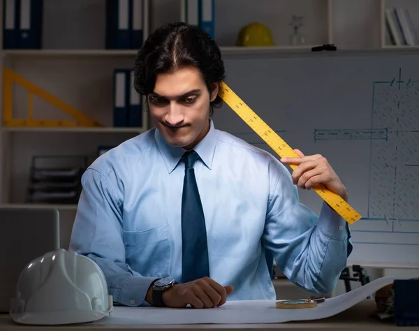 The young male architect working night at office — Stock Photo, Image