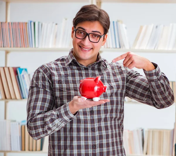 Junge Studentin in teurem Lehrbuchkonzept — Stockfoto