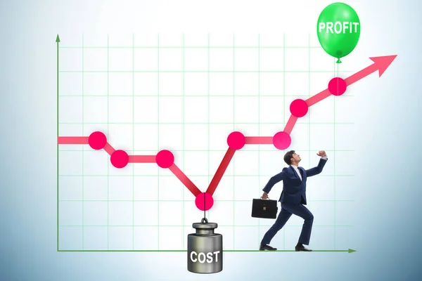 Diagram med vinst och kostnad och affärsman — Stockfoto