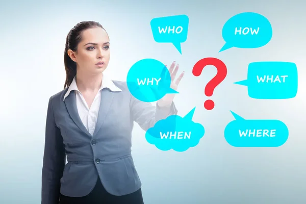 Concept of many different questions asked with businesswoman — Stock Photo, Image