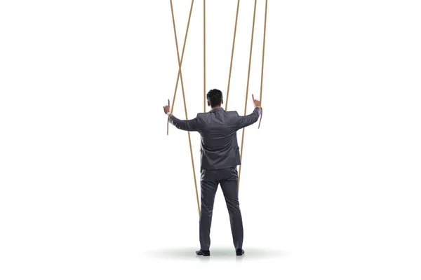 Marionetka biznesmena manipulowana linami — Zdjęcie stockowe