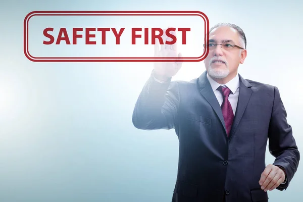 Safety first concept with businessman — Stock Photo, Image
