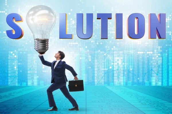 Concept of soluton with businessman and lightbulb — Stock Photo, Image