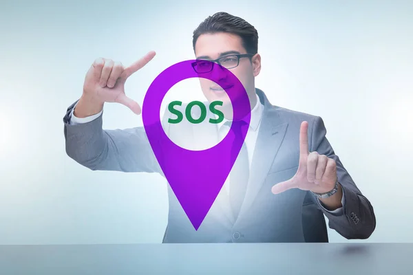 Zakenman drukt op de SOS-knop in geval van gevaar — Stockfoto