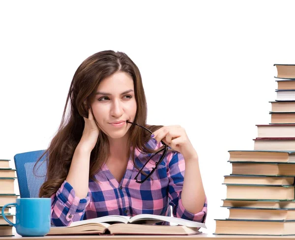 Joven estudiante preparándose para los exámenes de la universidad aislado en blanco —  Fotos de Stock