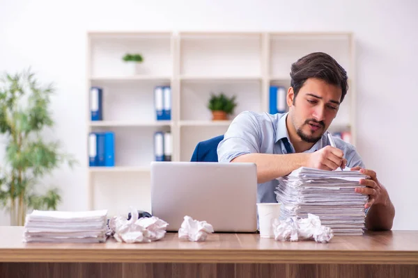 Young male employee rejecting new ideas in the office — Stock Photo, Image