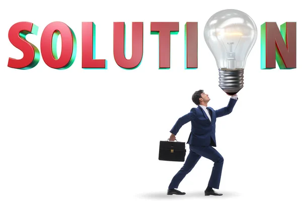 Concept of soluton with businessman and lightbulb — Stock Photo, Image