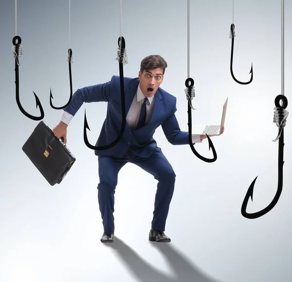 Businessman being tempted to bite the bait — Stock Photo, Image