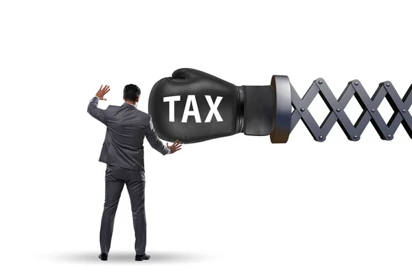 Tax concept with businessman being hit by boxing glove — Stock Photo, Image