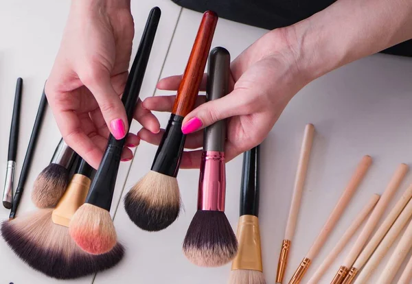 Collection of make up products displayed on the table