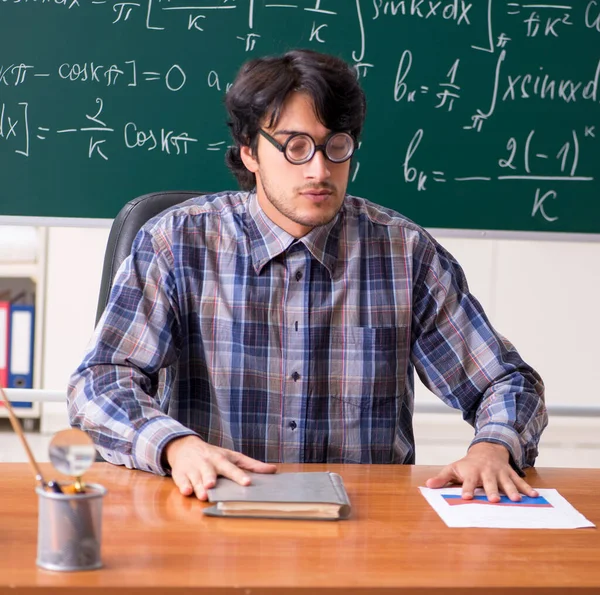 Funny male math teacher in the classroom — Stock Photo, Image