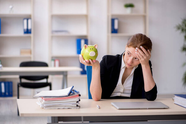 Young female employee in retirement concept