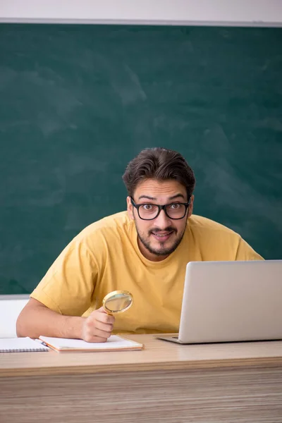 Young male student in telestudying concept — Stock Photo, Image