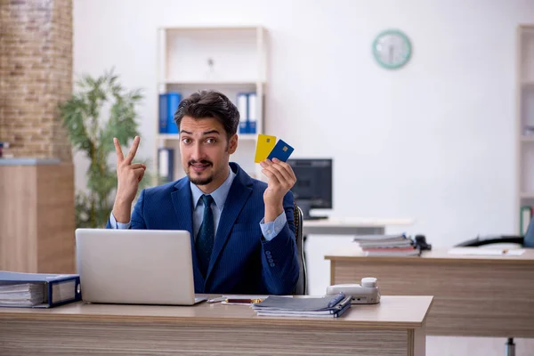 Young male employee working in the office — Stock Photo, Image