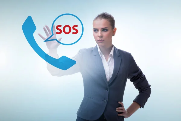Podnikatelka stiskne tlačítko SOS v případě nebezpečí — Stock fotografie
