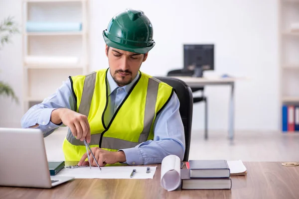 Young male architect working in the office — Stock Photo, Image