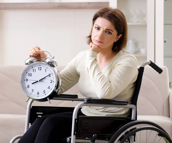 Woman in wheelchair at home — Stock Photo, Image