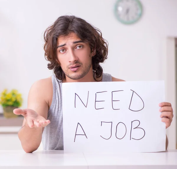 Unemployed man desperate at home — Stock Photo, Image
