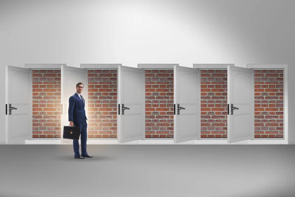 Businessman Facing Exit Brick Door — Stock Photo, Image