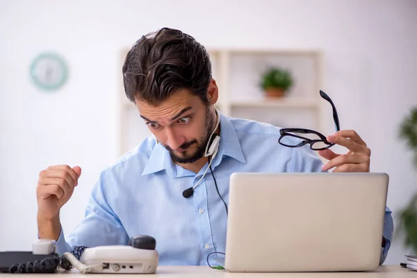 Young Call Center Operator Working His Desk — Stock Photo, Image